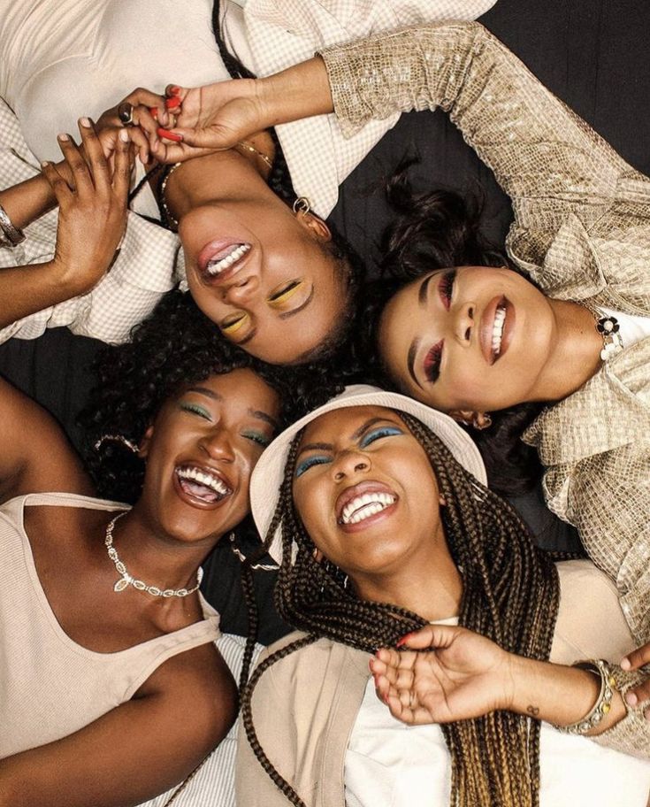 Young women smiling together